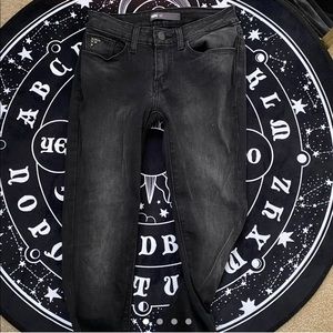 Levi’s black skinny jeans with studs